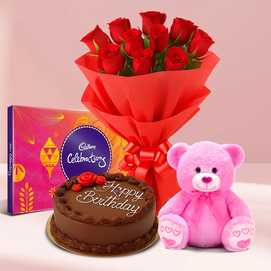 Gift combo featuring a chocolate cake, red roses, a teddy bear, and Cadbury Celebrations pack for a delightful birthday surprise.