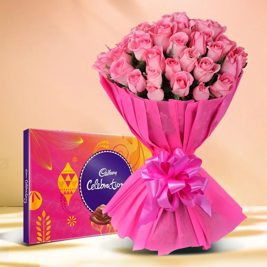 Joyful Rose and Chocolate Duo featuring 10 pink roses and Cadbury Celebrations pack. Perfect gift for anniversaries and special occasions.