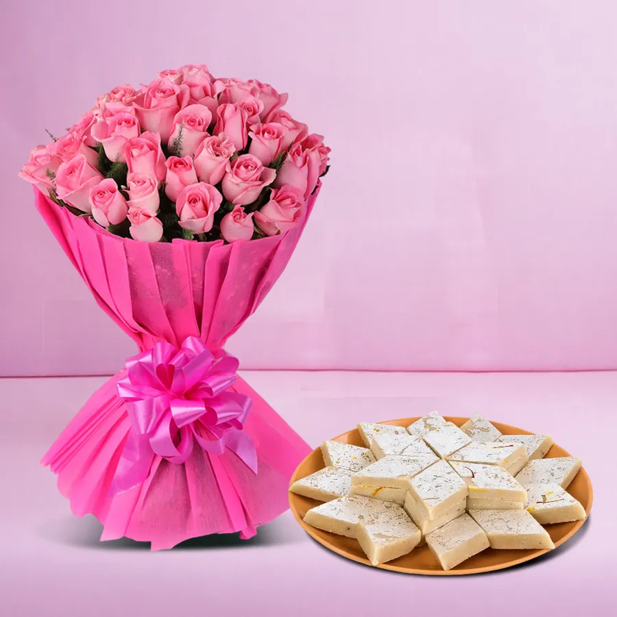Gift combo featuring 12 pink roses and 500 grams of delicious Kaju Kalti.