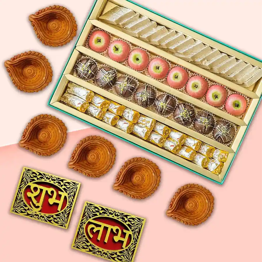 Diwali Delights Gift Set featuring assorted sweets, a Subh Labh wall sticker, and 6 Mud Diyas for festive celebrations.