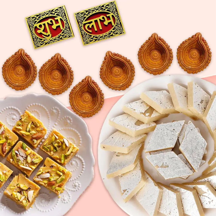 Diwali Sweet Treats Extravaganza featuring Soan Papdi, Kaju Katli, a wall sticker, and Mud Diyas for festive celebrations.
