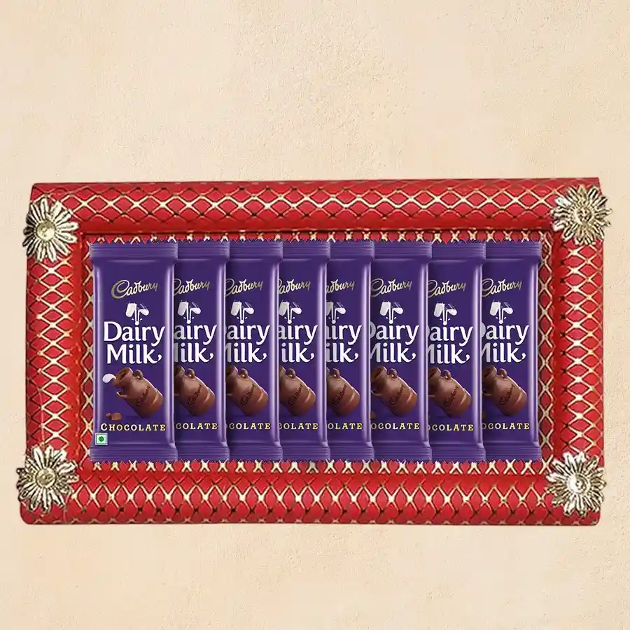 A beautifully arranged tray featuring 8 Cadbury Dairy Milk Bars, ideal for gifting.