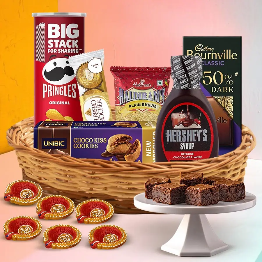 Sweet Celebration Chocolate Basket filled with cookies, chips, chocolates, and festive Diyas, perfect for Diwali gifting.