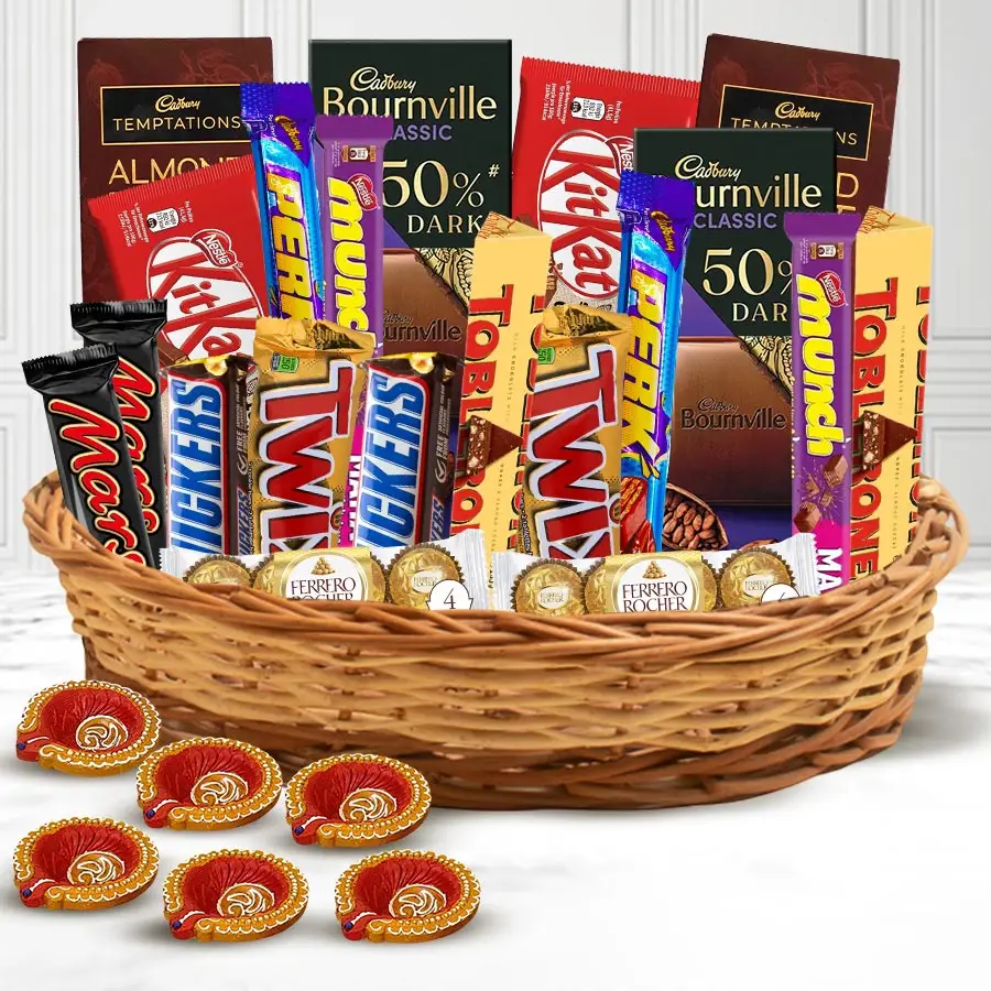 Chocolate Lovers' Feast Hamper showcasing a variety of chocolates and mud diyas, perfect for gifting on special occasions.