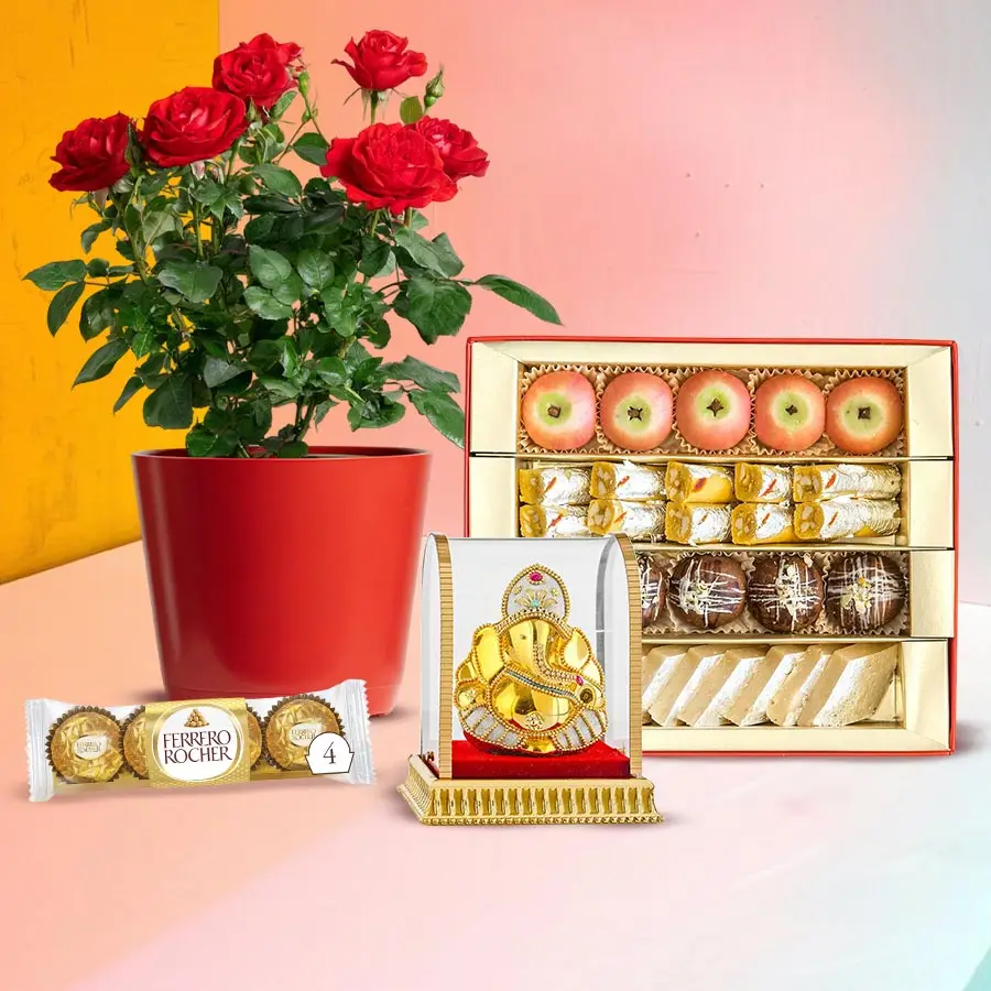 Luminous Rose Plant and Festive Treats combo with red rose, Ganesh idol, Ferrero Rocher chocolates, and Haldirams sweets.