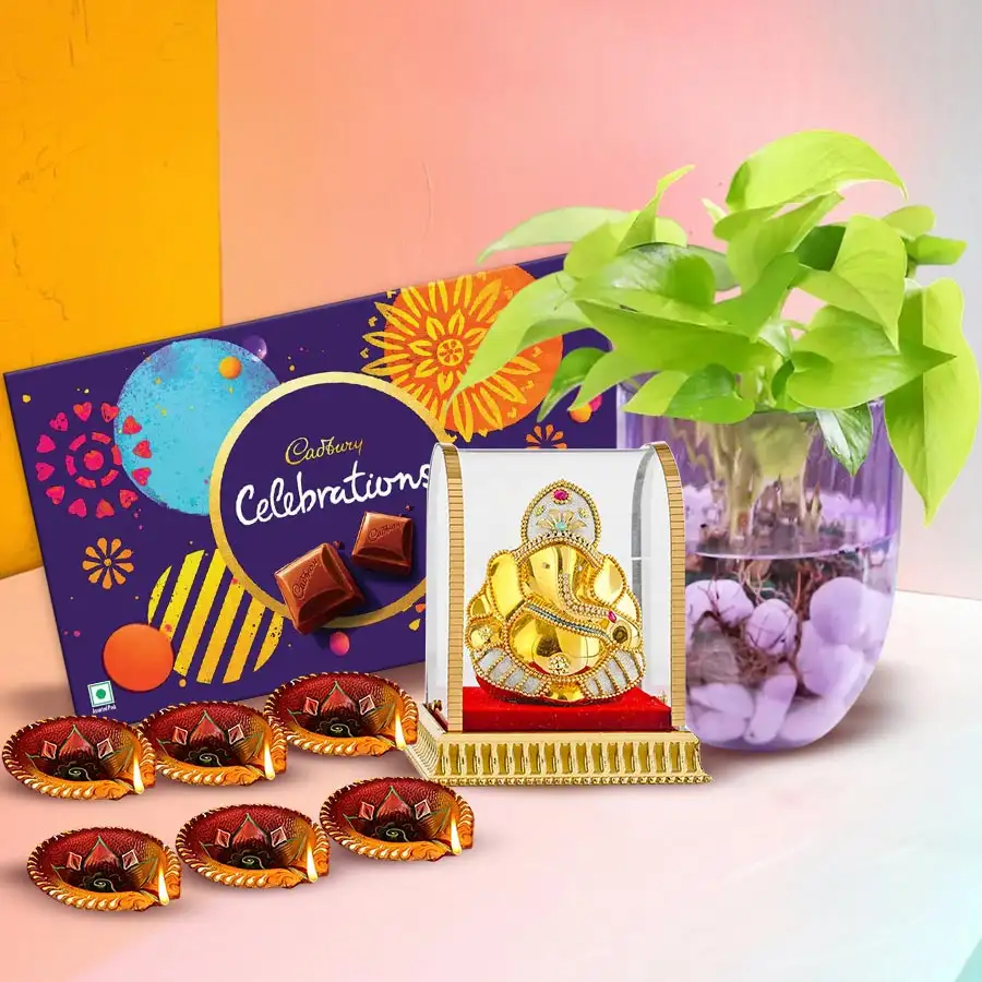 Wonderful Eco Friendly Combo Gift featuring Money Plant, Ganesh murti, Cadbury Celebrations, and Mud Diyas for Diwali.