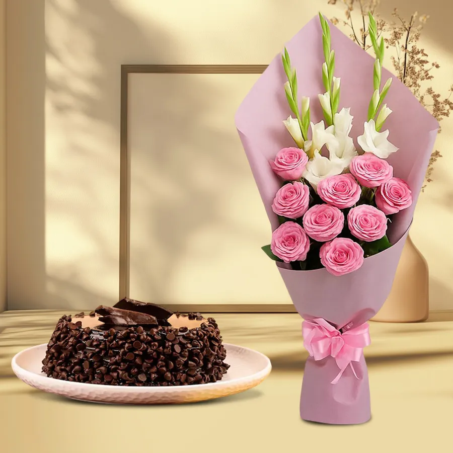 Romantic Floral Cake Surprise with pink roses, white gladiolus, and a chocolate cake.