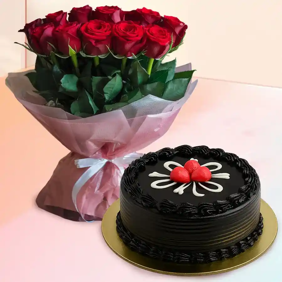 A delightful gift of 12 red roses and a round chocolate cake with a message card, perfect for expressing love and affection.