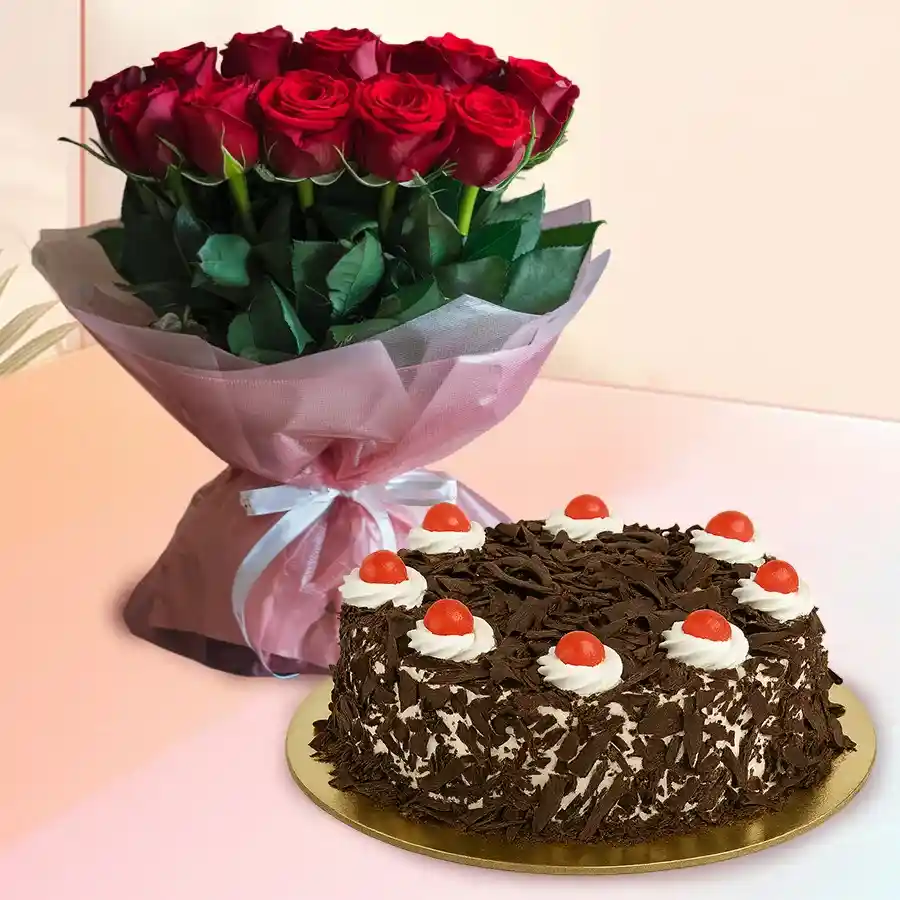 A tempting duo of a 1 kg Black Forest Cake and 12 red roses arranged beautifully, perfect for expressing love and affection.