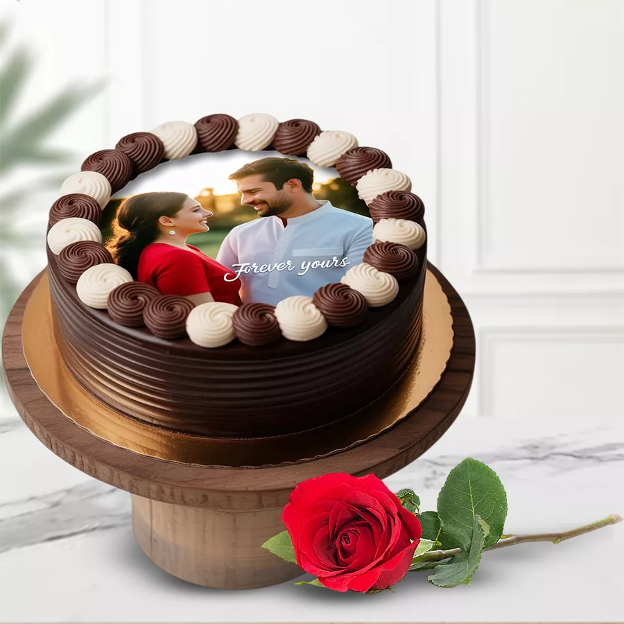 A stunning single red rose accompanied by a delicious chocolate photo cake, perfect for special occasions.