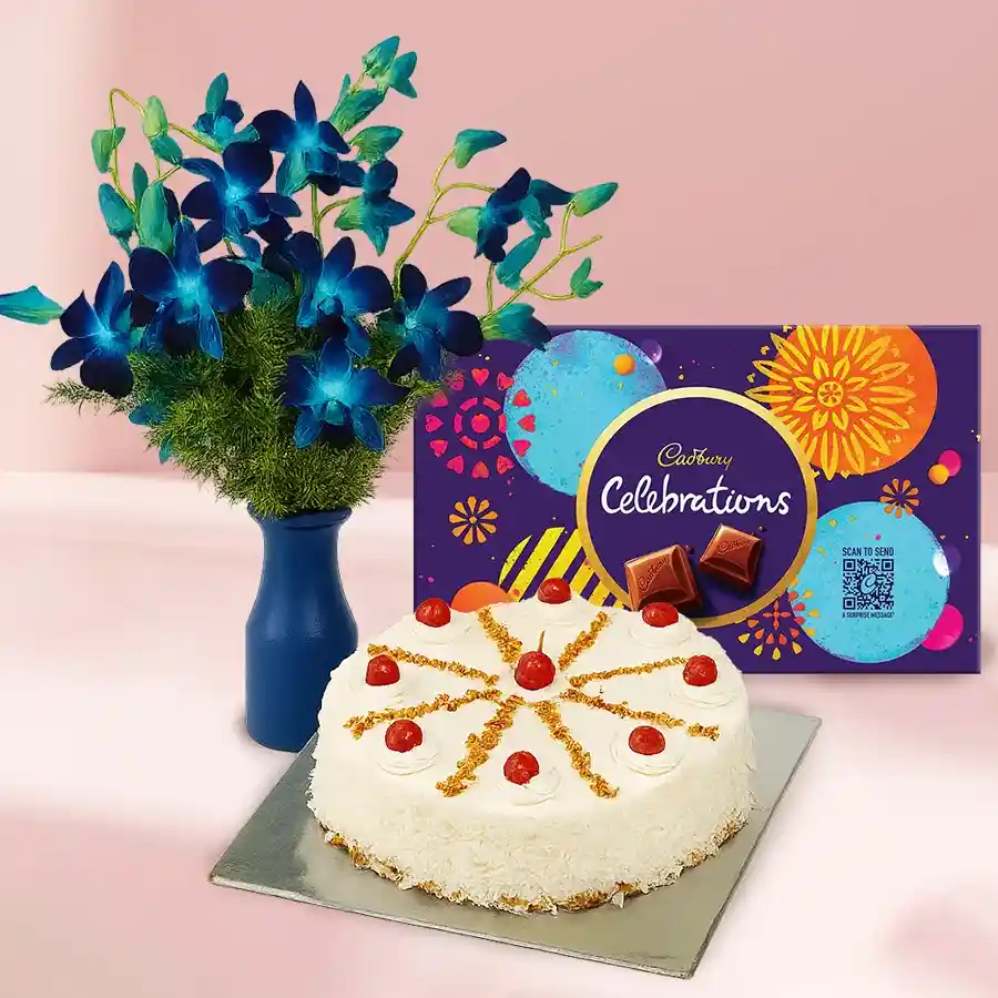 Exquisite gift combo featuring blue orchids, butterscotch cake, and Cadbury chocolates.