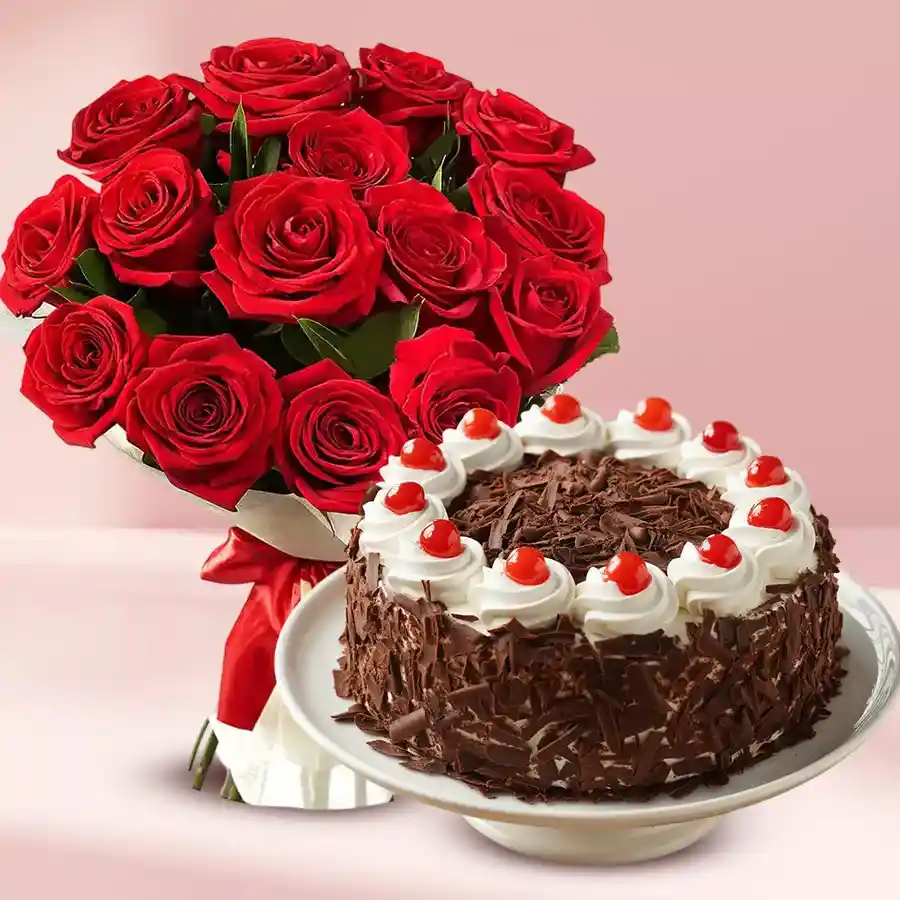 A beautiful arrangement of 12 Red Dutch roses alongside a 1/2 Kg eggless Black Forest cake, ready to delight loved ones.