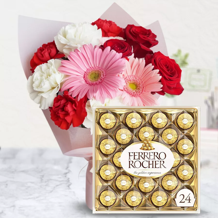 Hand-tied floral bouquet with red, white, and pink flowers paired with Ferrero Rocher chocolates in an elegant combo.