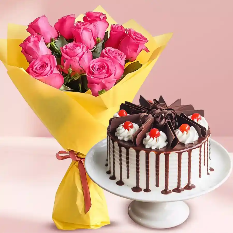 A beautiful bouquet of pink roses with a Black Forest cake, perfect for celebrations.