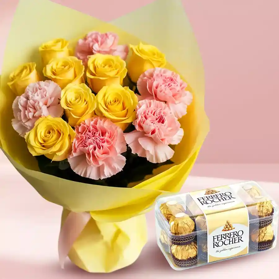 Joyful bouquet of yellow roses and pink carnations accompanied by Ferrero Rocher chocolates.