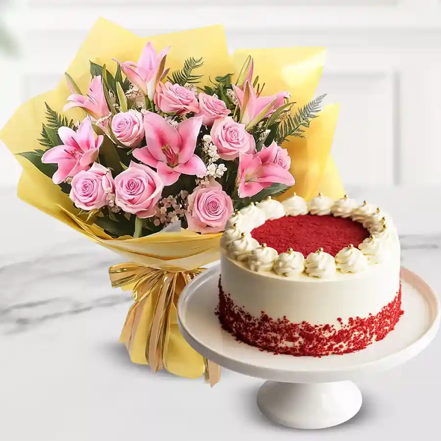 A beautiful bouquet of pink roses and lilies alongside a decadent eggless red velvet cake.
