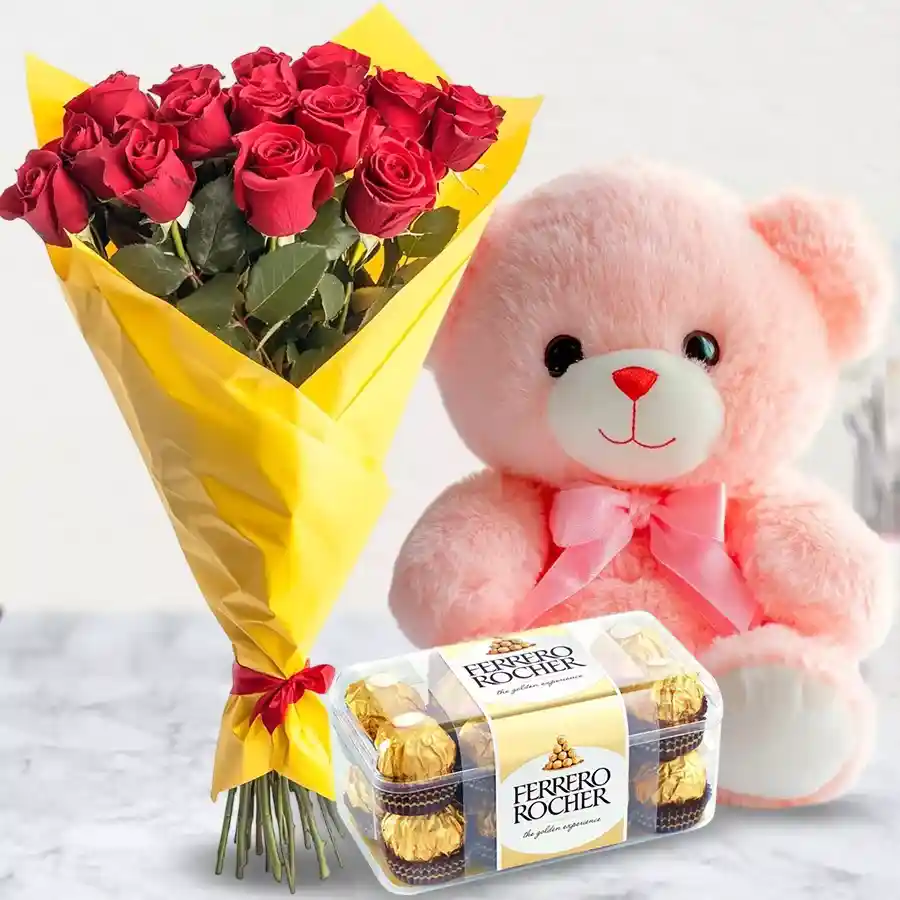 Heartfelt Rose and Chocolate Trio with red roses, Ferrero Rocher chocolates, and a pink teddy bear.