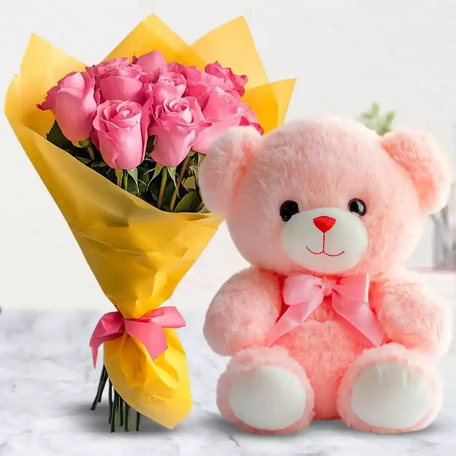 World of Pink Roses Bouquet featuring 18 roses and a 12-inch pink teddy bear.