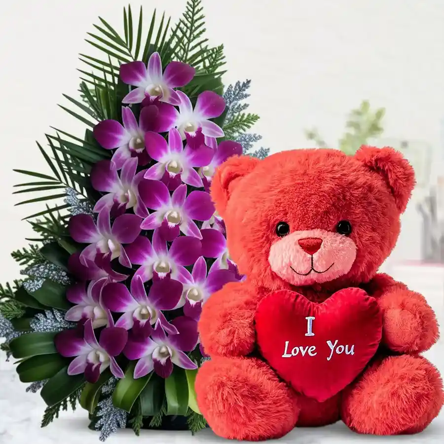 A basket featuring 6 vibrant purple orchids and a 12-inch red teddy holding a heart with "I Love You," symbolizing love and affection.