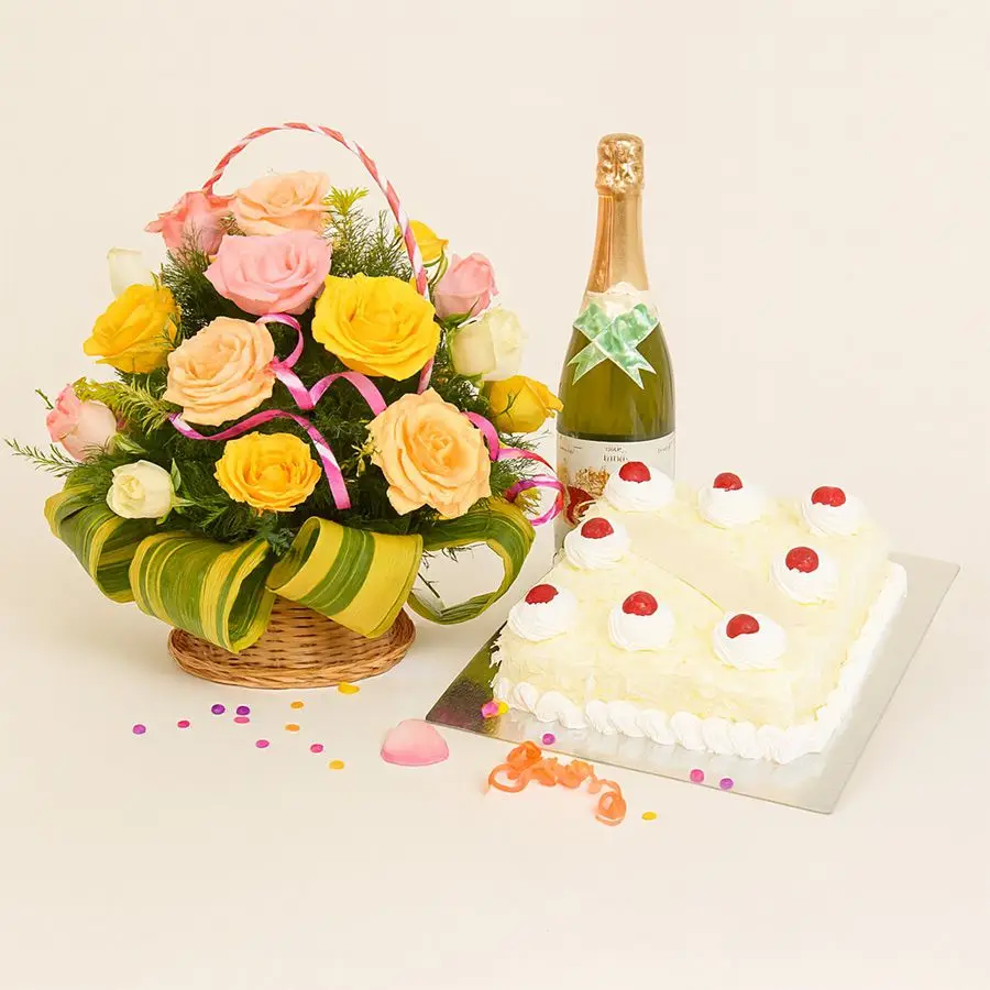 Soothing Roses Basket featuring pink, peach, white, and yellow roses, alongside a White Forest Cake and fruit juice.