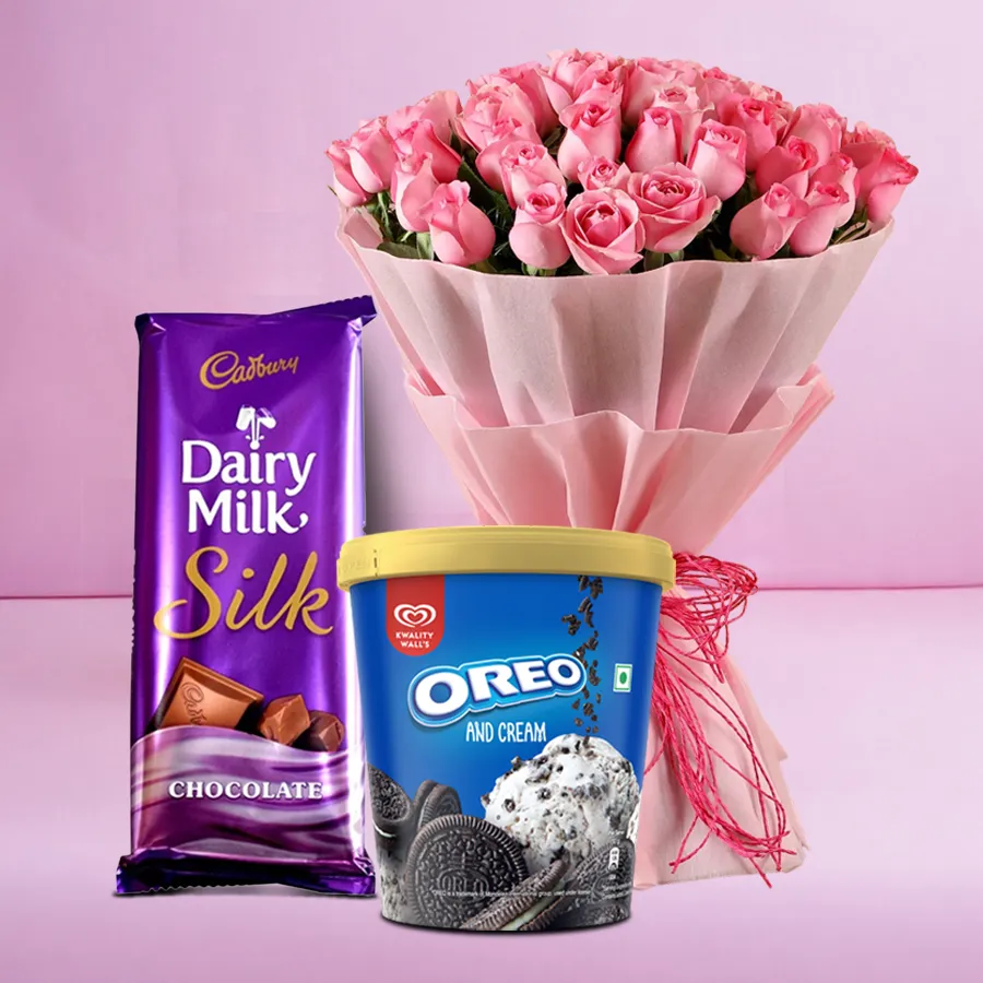 Charming pink roses bouquet with Oreo ice cream tub and Cadbury chocolate bar.