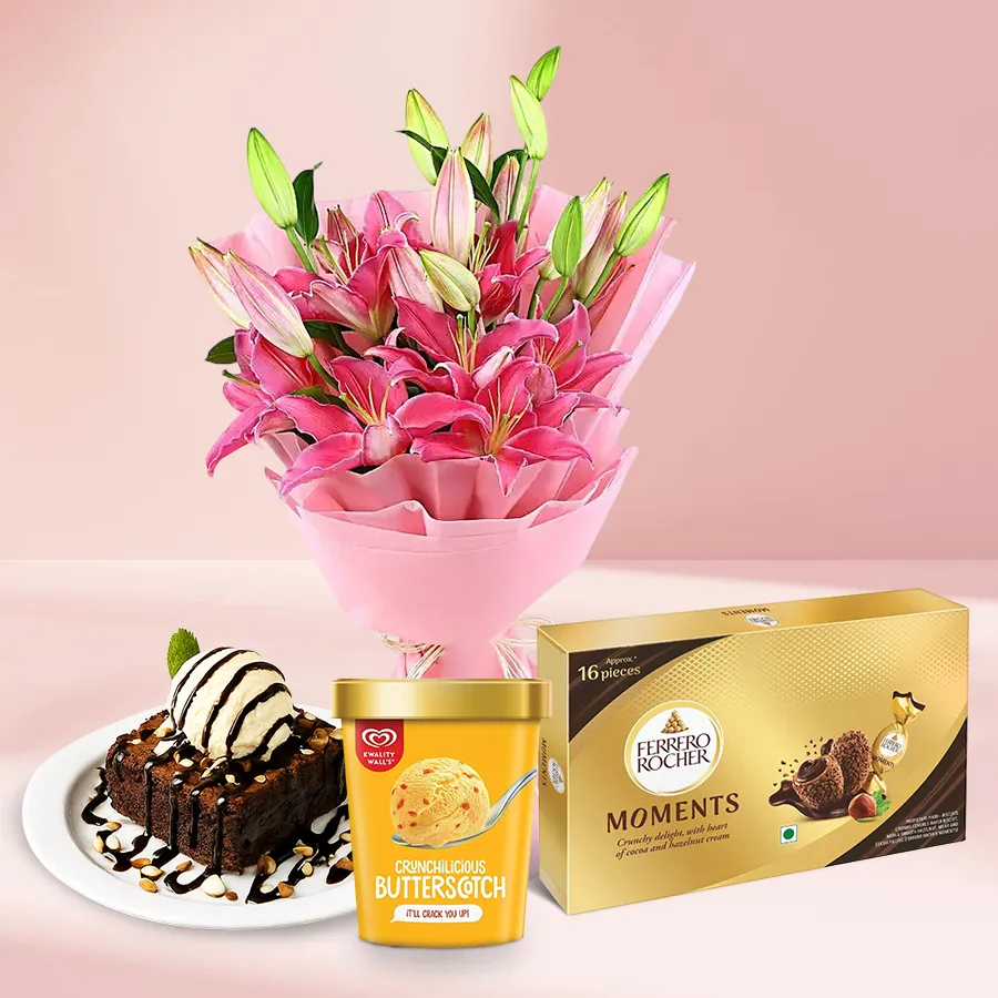 A stunning combo featuring pink lilies, chocolate brownies, butterscotch ice cream, and Ferrero Rocher chocolates for Mother's Day.