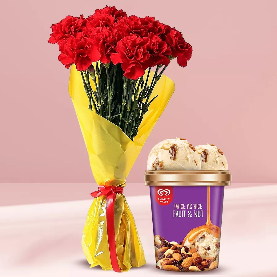 Mesmerizing red carnation bouquet paired with Kwality Walls Fruit n Nut ice cream, perfect for expressing affection.
