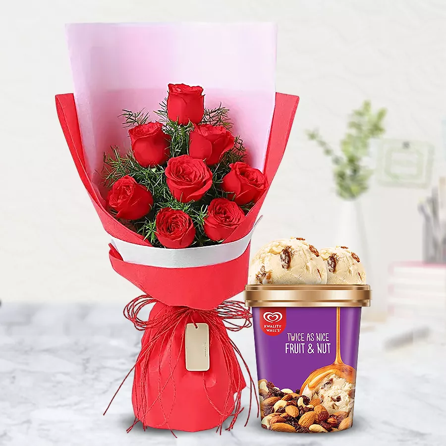 A bouquet of 8 red roses paired with a tub of Kwality Walls Fruit n Nut Ice-Cream, perfect for gifting.