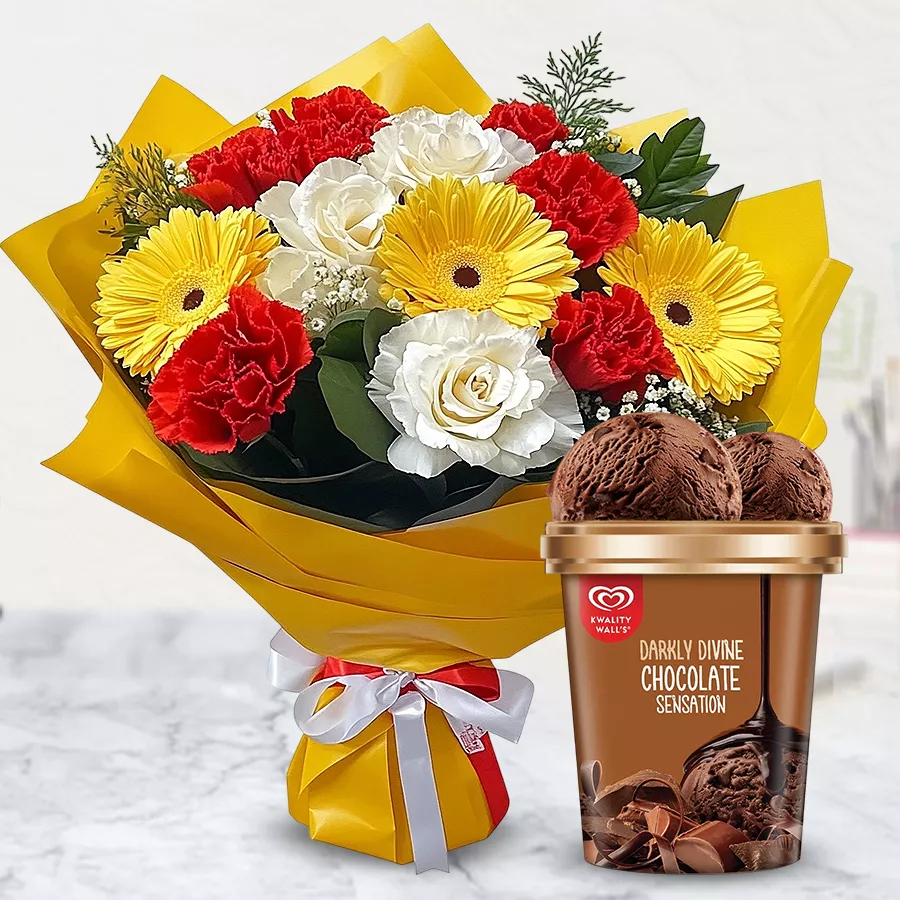 Cheerful mixed flower arrangement with Kwality Walls chocolate ice cream.