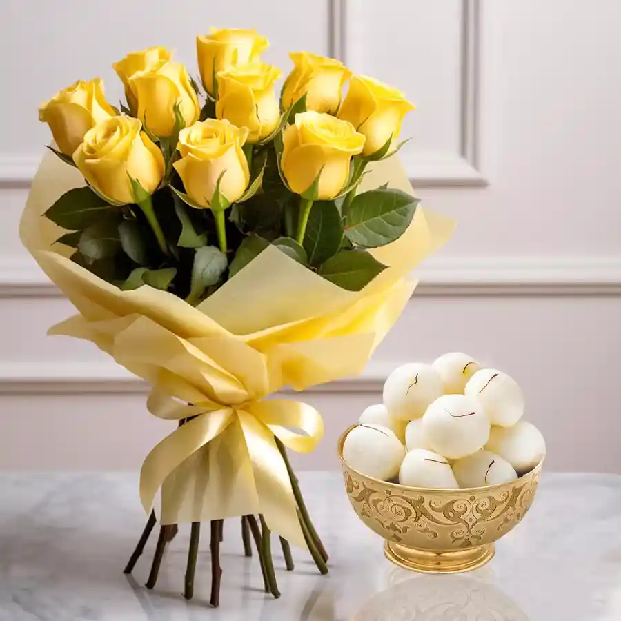 A beautiful bouquet of yellow roses alongside a tin of Haldiram Rasgulla weighing 1kg.