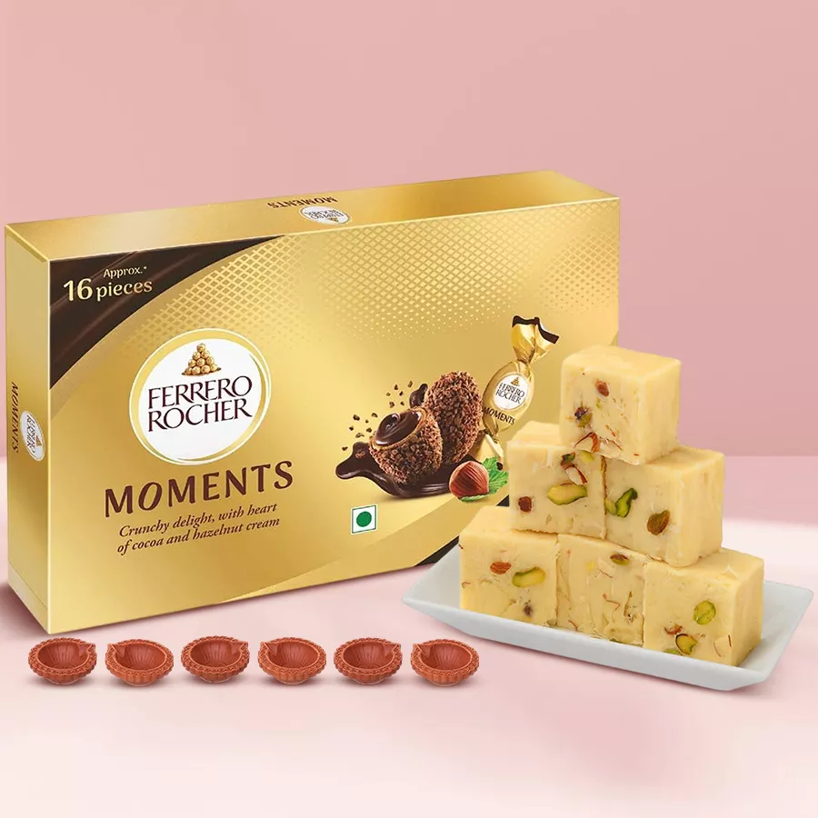 Festive Treats of Joy and Light gift combo with Ferrero Rocher, Soan Papdi, and decorative diyas for Deepavali celebration.