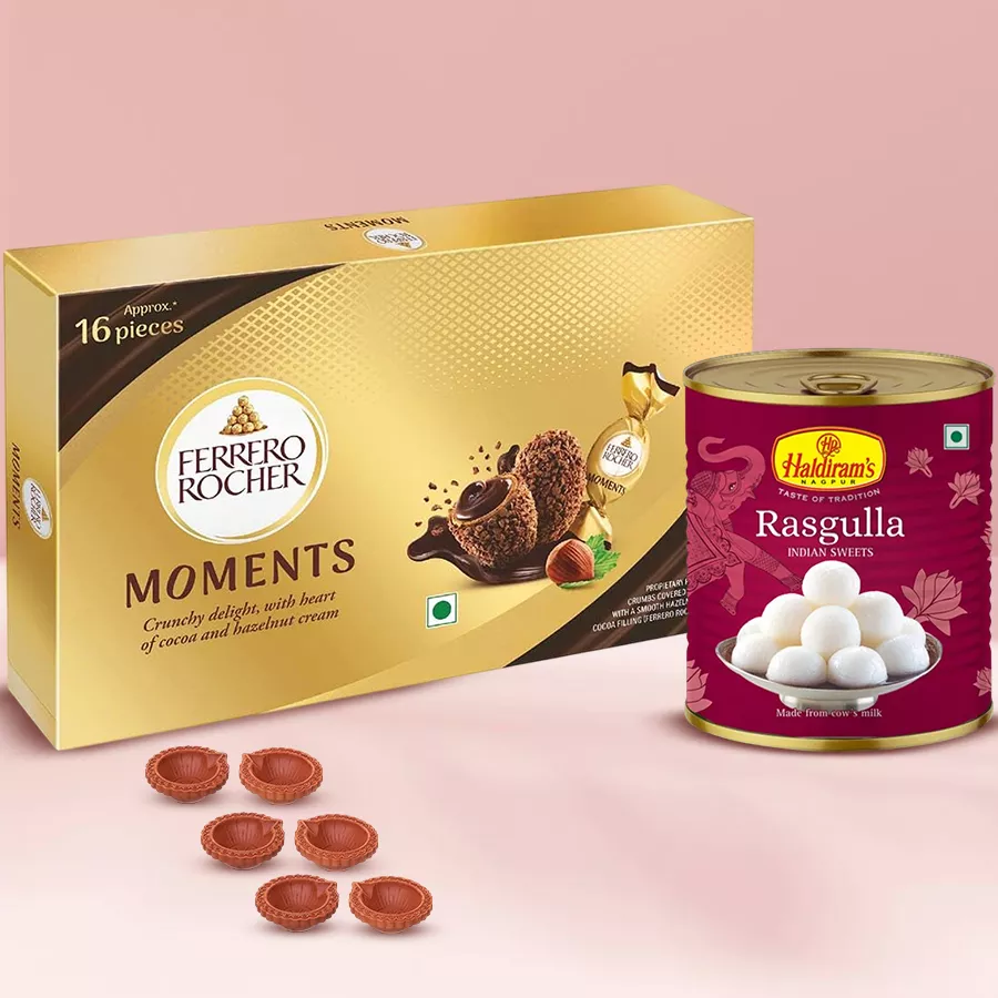 Divine Diwali Delights Combo featuring Ferrero Rocher chocolates, Haldiram Rasgulla, and decorative diyas.