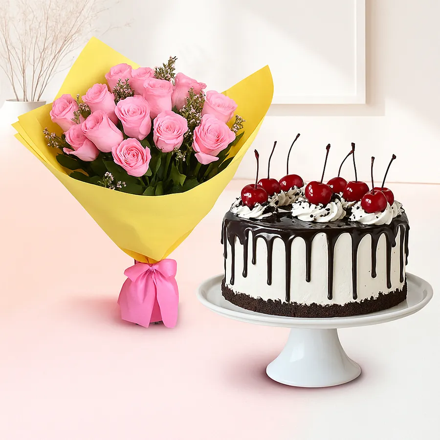 A charming bouquet of soft pink roses alongside a delectable half-kilogram Black Forest cake.