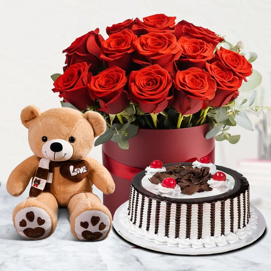 Gift combo featuring 25 red roses, a 1 lb Black Forest cake, and a 6-inch teddy bear.