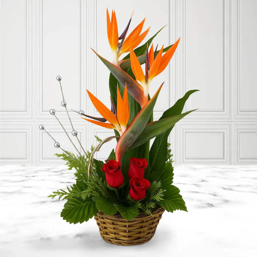 Exotic Floral Celebration Basket with assorted Red Roses and Bird of Paradise flowers.