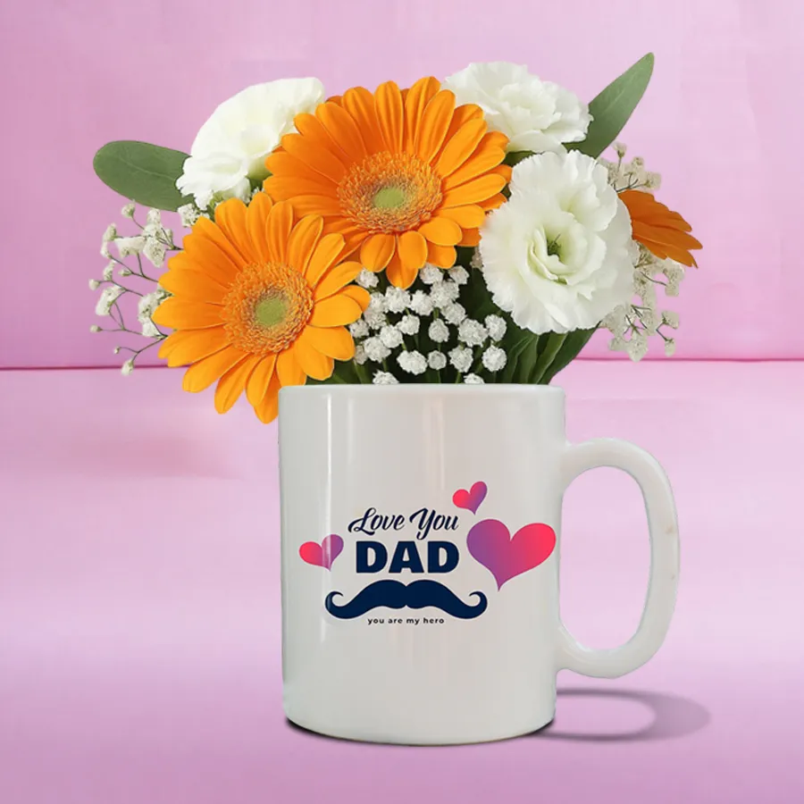 Colorful floral arrangement in a Dad printed mug with gerberas and carnations.