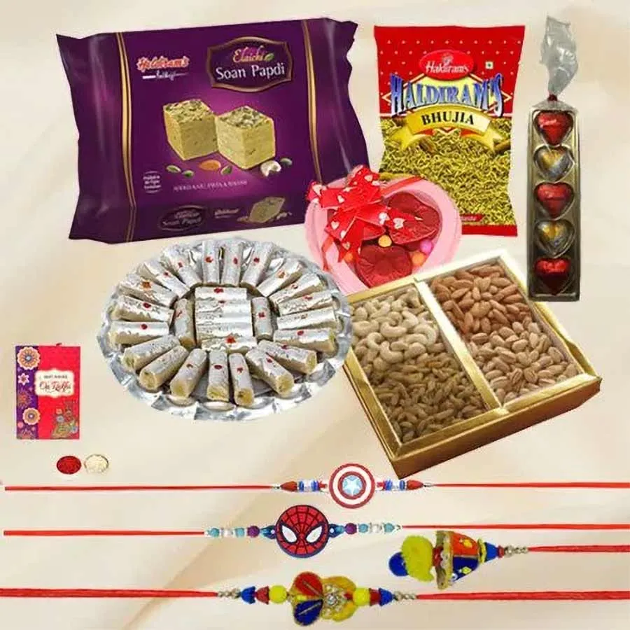 Fun to Much Ensemble from Haldiram featuring sweets, dry fruits, homemade chocolates, Family Rakhi Set, and traditional Roli Tilak Chawal arranged in an attractive display.