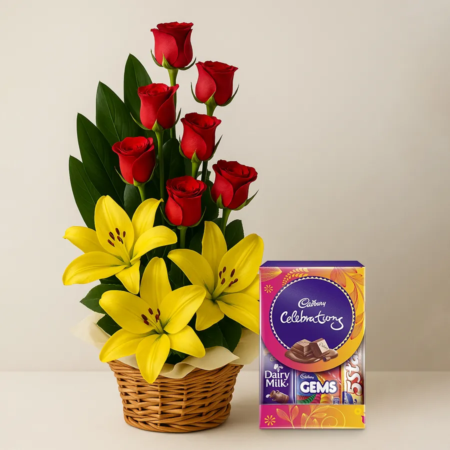 A beautiful arrangement of yellow lilies and red roses with Cadbury Celebration chocolates, symbolizing joy and affection.
