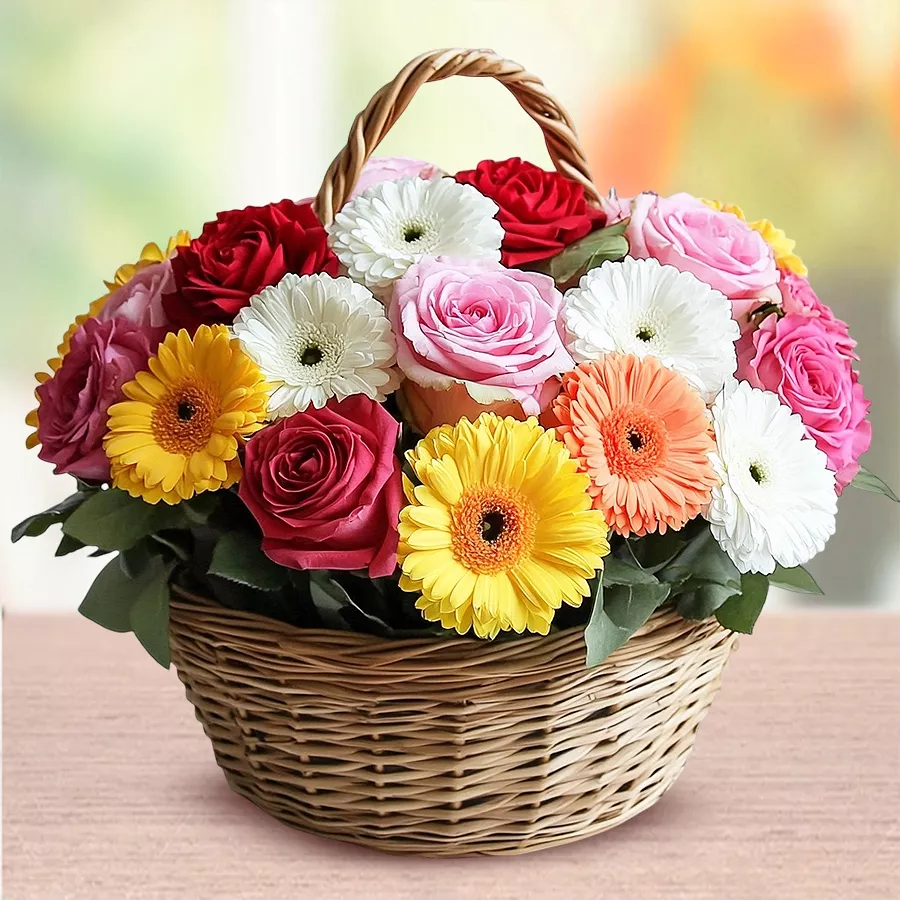 Blossoms of Joy Floral Basket with mixed roses, carnations, and gerberas.