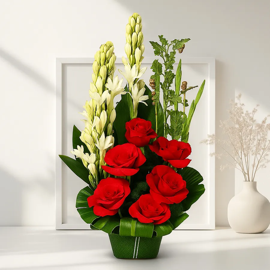 Charming arrangement of 10 red roses and white tube roses, perfect for expressing love and joy.