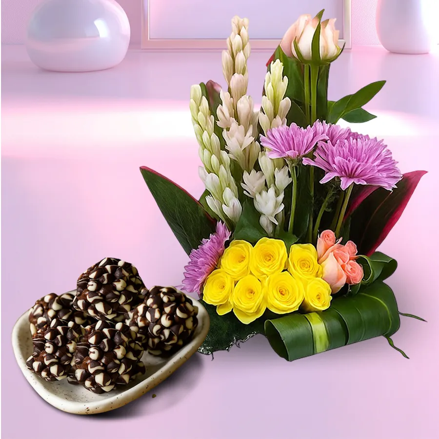 Delectable Kaju Chocotwin paired with a vibrant mixed flower arrangement from Sangam Sweets.