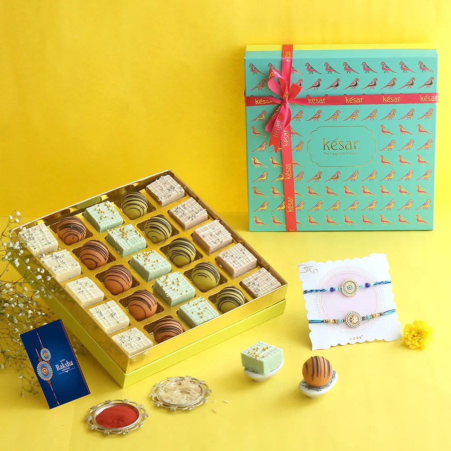Stunning Rakhi & Sweet Serenity Box featuring blue rakhis and assorted sweets.