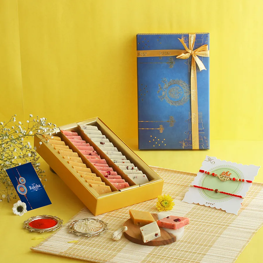 Graceful Rakhi & Katli Delight Combo featuring Ram Rudra Rakhis and assorted Katli flavors.