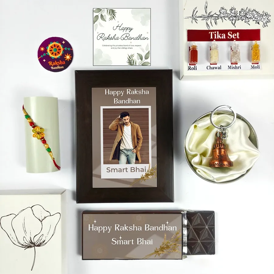 Heartwarming Brotherly Rakhi Celebration Set featuring Rakhi, chocolate, photo frame, greeting card, guardian bell, and tika set for Raksha Bandhan.