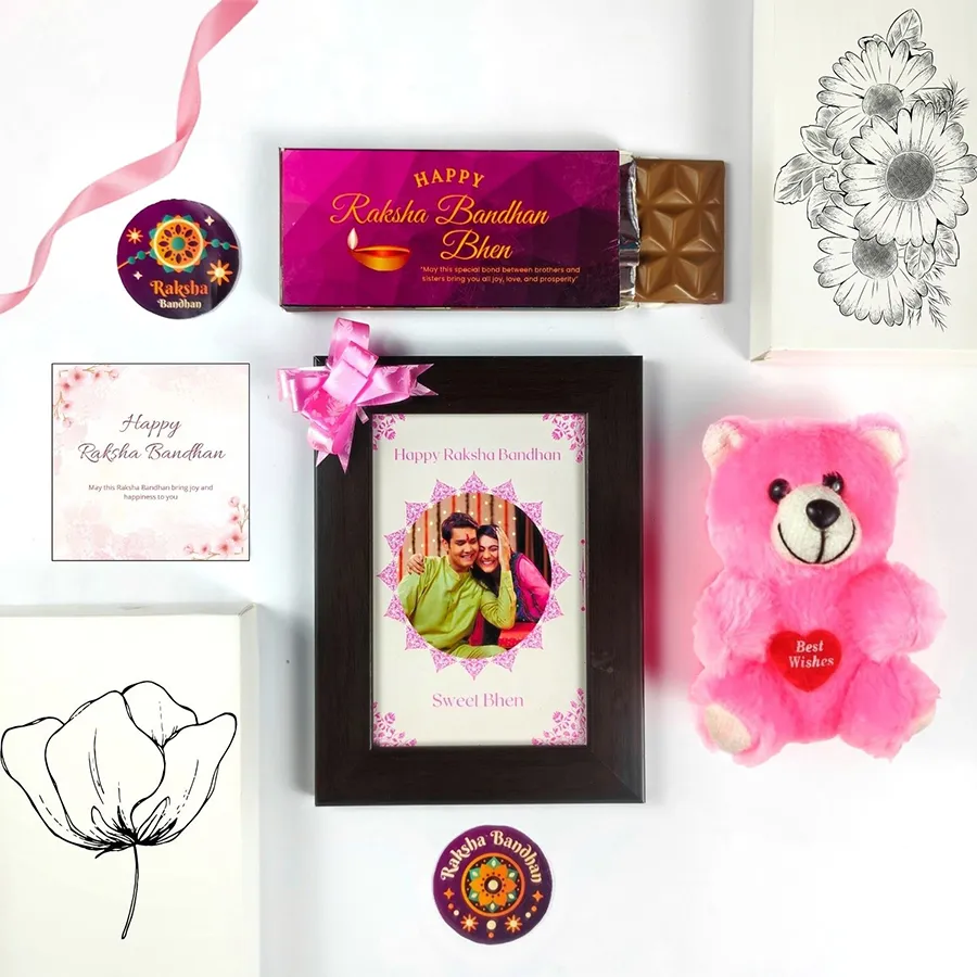 Sister's Sweet Surprise Rakhi Gift Pack with chocolate, photo frame, teddy bear, and greeting card for Raksha Bandhan.