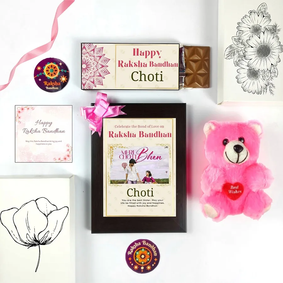 Cherished Moments Raksha Bandhan Set featuring chocolate, a photo frame, a teddy bear, and a greeting card.