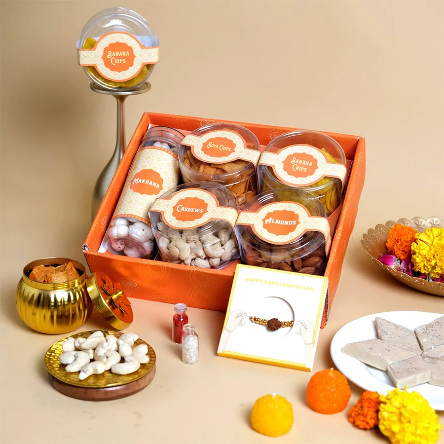 Crunchy Delights Rakhi Gift Set with snacks and a Rudraksha Rakhi on a festive tray.