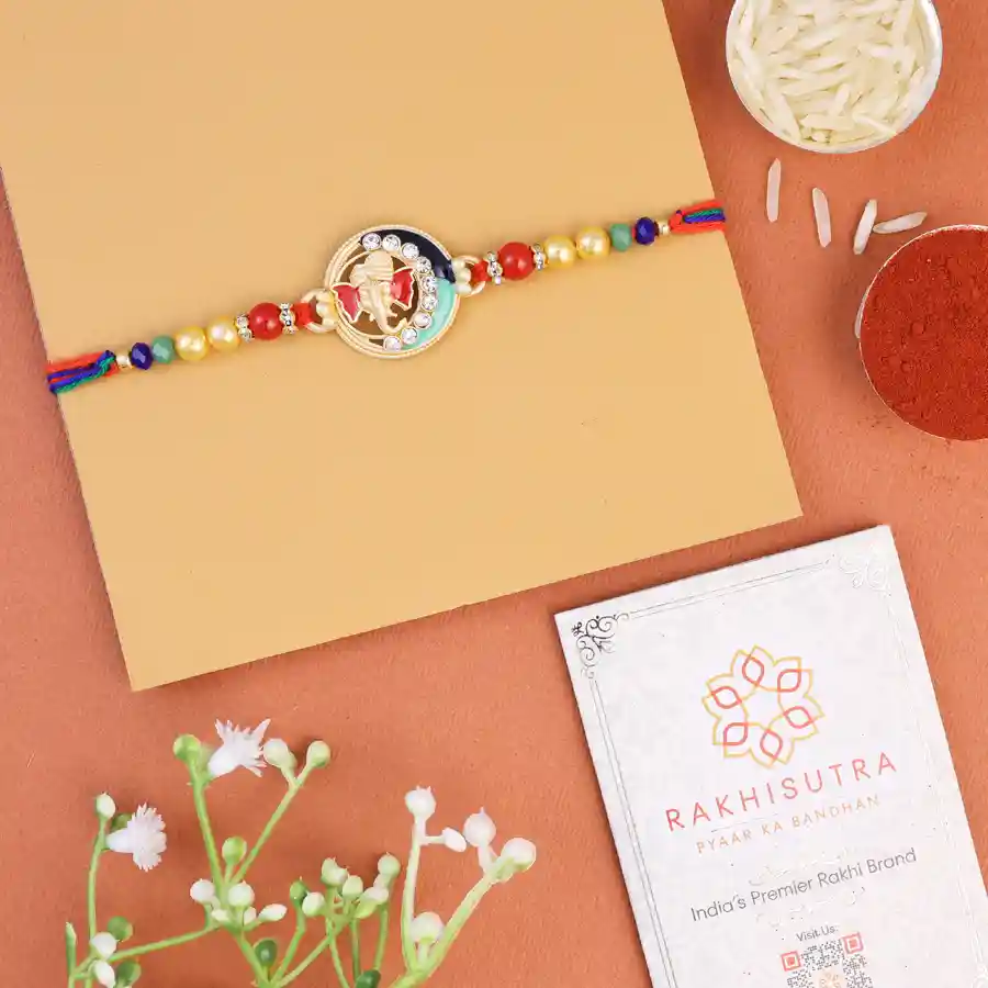 Gorgeous Ganesh Rakhi set with traditional blessings