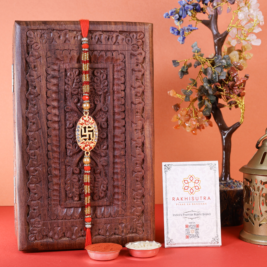 Sacred Swastik Rakhi ensemble for sibling celebration