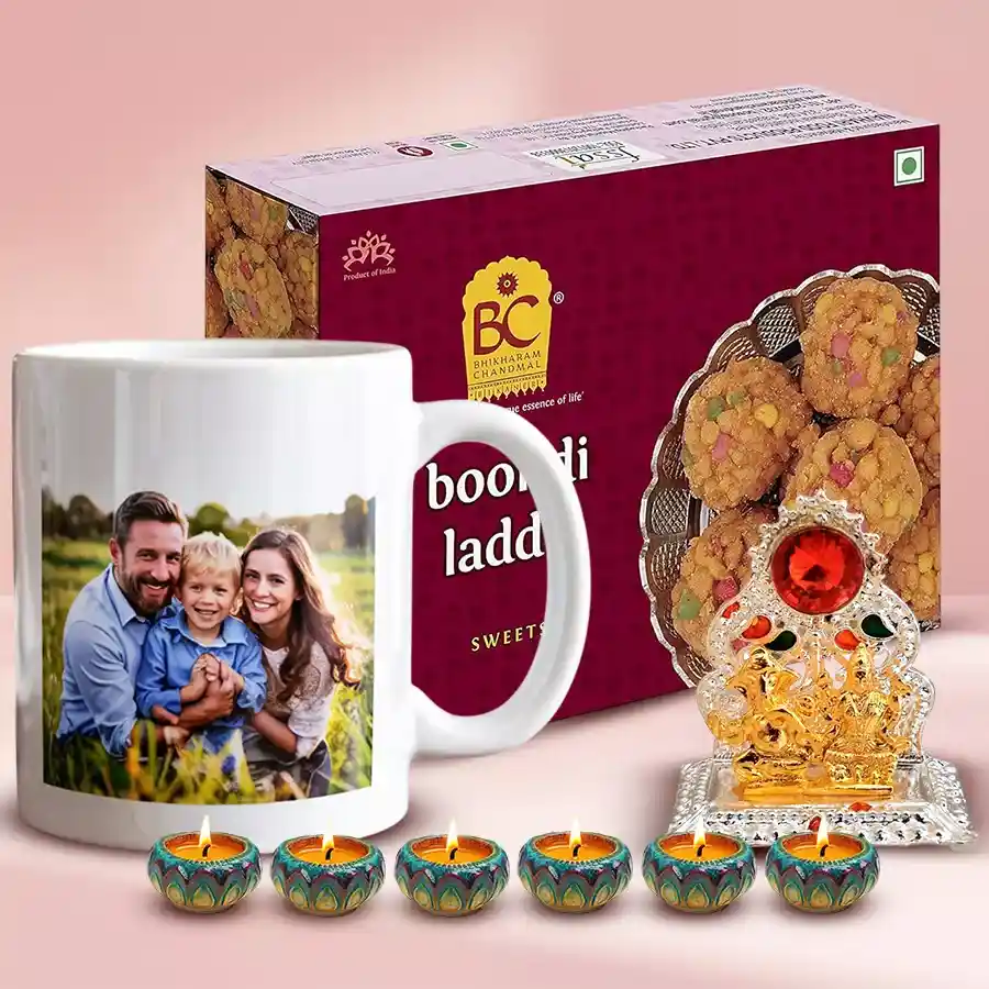 Personalized coffee mug with Ganesh Laxmi Mandap design, Bhikaram Ghee Boondi Ladoo, and six elegant designer diyas for Diwali celebration.